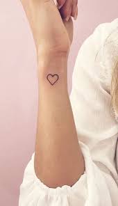 Upper arm tattoos have a lot of room to add multiple elements. Small Heart Tattoos Some Of My Favorite Tattoo Ideas For Small Heart Body Tattoo Art