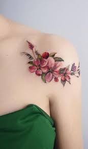 Colored Cherry Blossom Tattoo Along The Shoulder Www Otziapp Com Floral Watercolor Tattoo Tattoos For Daughters Beautiful Flower Tattoos
