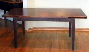 This shape can seat up to 10 people when fully extended, making it ideal for those who enjoy hosting large scale dinner parties at home or simply have a large family. Custom Made Dutch Pull Or Draw Leaf Dining Table By North Texas Wood Works Custommade Com