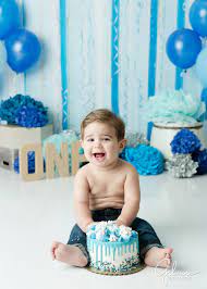 Be sure to snap a picture of the colourful icing before he gets started! Cake Smash Photography For Boys Gilmore Studios Orange County Newborn Photographer Cake Smash Photography Smash Cake Photoshoot Smash Cake Boy Birthday Cake Smash