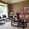 Especially in the living room the warmer colors have been added with warm curtains but what really brings a warm and cozy vibe to this room is the large fluffy rug. 1