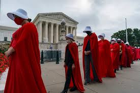 Women have been supreme court justices before, but let's face it, they were no oil paintings. Handmaid S Tale Protesters Gather Outside Supreme Court To Oppose Amy Coney Barrett Confirmation The Independent