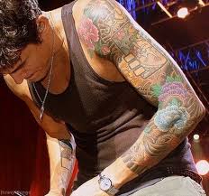 John mayer's tattoos enhance his personality making his body a 'wonderland'. John Mayer John Mayer Tattoo Music Tattoo Sleeves Tattoo Sleeve Men