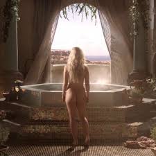 In season 1, Daenerys shed her clothes and got into a boiling hot bath.  This is a subtle nod to season 8, where she sheds her character development  and boils King's Landing