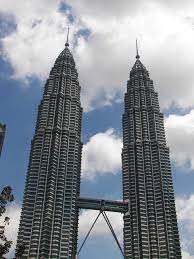 The petronas towers, also known as the petronas twin towers, are twin skyscrapers in kuala lumpur, malaysia. Petronas Twin Towers Kuala Lumpur Facts Location Best Time To Visit Ticket