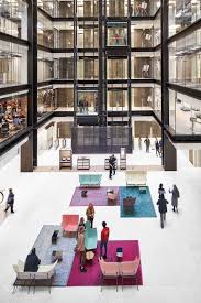 At Google S London Office Ahmm Overturns Decades Of Workplace Norms Google Office Atrium Design Office Interiors