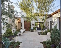 Beautiful No Grass Tiled Walled Garden With Outdoor Fireplace In 2020 European Garden Spanish Style Homes Spanish Courtyard