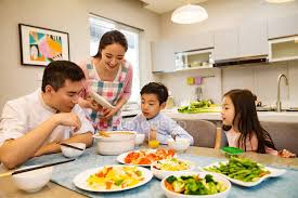 Are you ready to spend all your money on d. Happy Asian Family With Two Kids Having Dinner Together At Home Siblings Parenting Stock Photo 278078528