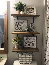 Getting one with metal wires and a wooden trim will give it a more. Bathroom Shelves Rustic Bathroom Diy Small Bathroom Decor Small Bathroom Remodel Designs