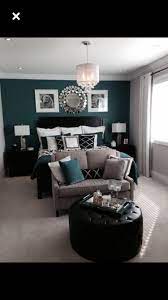 Teal Grey Bedroom With Loveseat As Footboard Remodel Bedroom Master Bedrooms Decor Bedroom Makeover