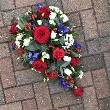 It is designed with red gerbera, white avalanche roses, white freesia and. Red White And Blue Funeral Flowers Single Ended Spray Tribute Funeral Flowers Sympathy Flowers Flowers