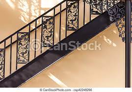 28 years of experience, honest service and high. Wrought Iron Railing Detail Against Yellow Wall Canstock
