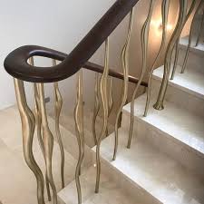 The classic iron staircase undergoes a contemporary reinterpretation in our exclusive opus design; Creative Balustrades Spindles Zigzag Design Studio