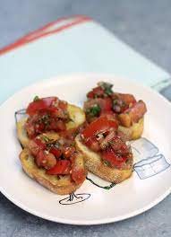 Step 1 stir tomatoes, basil, 3 tablespoons olive oil, red onion, garlic, red wine vinegar, and pepper together in a bowl; Bruschetta With Fresh Tomatoes And Herbs Make Ahead Appetizer