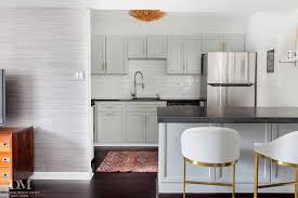gray kitchen cabinets with hot rolled