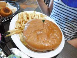 What A Burger As Big As Your Head Go To Kelley S Country Cookin What A Burger Food Burger