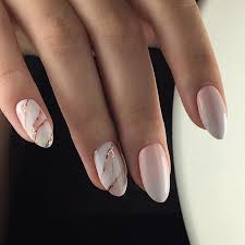 Marble nail designs not only look fantastic, but they are also pretty easy to make because all you have to do is dip your nails into a water bowl that has floating nail polish. Creamy Marble Nails With Gradient Nail Art Designs