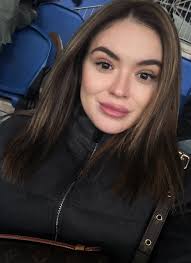 Real Madrid families — Thibaut and Mishel with Adriana, Nicolas, her...