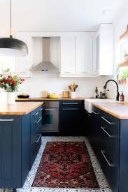 My top concerns with butcher block were staining, scratching, and. Blue Kitchen Cabinets With Butcher Block Countertops Decorkeun