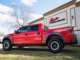 Both deliver the heat under the hood. 2014 Ford F 150 Svt Raptor Roush Edition