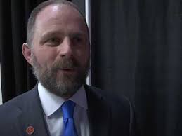 Albia coach Dave Wenger after Aden Reeves championship win