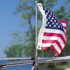 The flag pole kit consists of a 12 inch chrome flag pole, a chrome adjustable fold down base, chrome ⅝ inch ball and a chrome flag pole clamp to fit a ½ or ⅝ inch rail. Taylor Made Rail Mount Pulpit Flag Staff