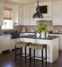 Dark Hardwood Floors With Antique White Cabinets Thenest Home Kitchens Kitchen Remodel Kitchen Renovation