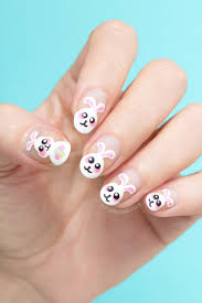 The nails have been painted in a soft sky blue and have two vibrant eggs as an accent nail. Cute Easter Nails Easter Bunny Stole My Eggs