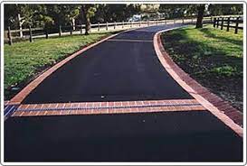 Another use is to channel water to limit erosion on driveways on an incline. Jakes Asphalt Driveways Asphalt Driveway Lake Landscaping Driveway Paving