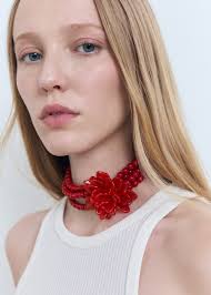Collar bolas detalle flor