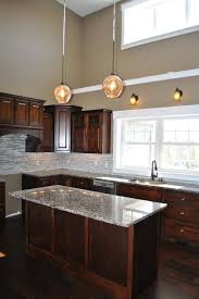 Dark Brown Kitchen Cabinets Granite Counter Tops White Trim Beige Paint Pantry Door With F Dark Brown Kitchen Cabinets Brown Kitchen Cabinets Brown Kitchens