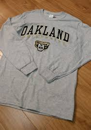 Oakland University Golden Grizzlies Grey Arch Mascot Long Sleeve T Shirt 22783738 In 2020 Long Sleeve Tshirt Men Shirts Shirt Designs