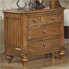 This piece is crafted from pine veneers, pine solids, and wood products, and features a mellow honey pine finish… 1656 63 Flexsteel Wynwood Furniture Drawer Nightstand Honey Pine