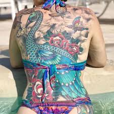 It is sought after by many people, especially a large piece can be drawn such that it extends from the base of the back to the upper part of the. 22 Stunning Peacock Tattoo Designs And Where To Ink Them Sortra