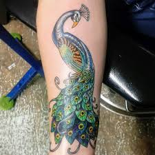 Then, of course, there are the traditional types. 100 Amazing Peacock Tattoos With Meanings And Ideas Body Art Guru