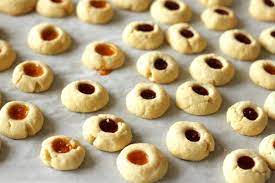 In austria we know that christmas time has finally arrived when we see and smell our popular linzer cookies at local bakeries and 10 minutes. Austrian Jam Thumbprint Cookies Living On Cookies Osterreichische Rezepte Rezepte Amerikaner Rezept
