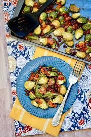Crumble bacon over brussels sprouts. Roasted Brussels Sprouts Asparagus With Bacon Pecans Brea Getting Fit