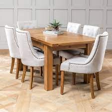 Oak dining table and 6 chairs. Solid Oak Medium Extending Dining Table 6x Natural Fabric Chairs The Furniture Market
