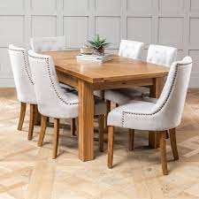 Oak kitchen table and chairs. Solid Oak Medium Extending Dining Table 6x Natural Fabric Chairs The Furniture Market
