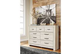 Four drawers along the front, and six open shelves along the sides. Bellaby King Platform Bed With 2 Storage Drawers With Dresser Ashley Furniture Homestore