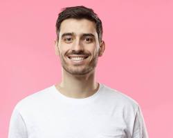 Image of person smiling confidently