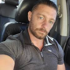 How to rescue a man stuck in his vehicle due to flooding in Pensacola, FL?