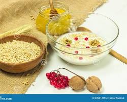 Imagine cu bowl of barley with milk and honey.