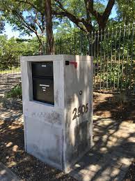 Check out our fence mailbox selection for the very best in unique or custom, handmade pieces from our mailboxes shops. Mail Box Design To Match Plaster Fence Mailbox Design Custom Mailboxes Drop Box Ideas
