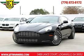 Image result for Jet Black 2011 Aston Martin