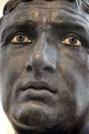 This bronze face, found