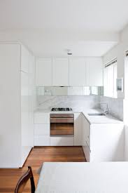 Small Kitchen Design Ideas Photography By Jason Busch Styling By Megan Morton Small Kitchen Renovations Small White Kitchens White Modern Kitchen