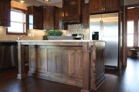If you're looking for cabinet doors that have a knotty quality that natural knottiness means it's less likely that you'll find melamine veneers as part of your alder cabinets. Custom Knotty Alder Cabinets Mc Custom Homes