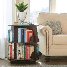 The Reader S Rotating End Table Hammacher Schlemmer Revolving Bookcase Coffee Table Bookshelf End Tables