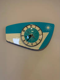 Handmade Formica Wall Clock In Turquoise From Royale Etsy Clock Wall Art Mid Century Clock Wall Clock